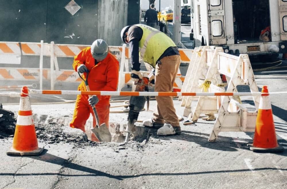 workers digging a hole