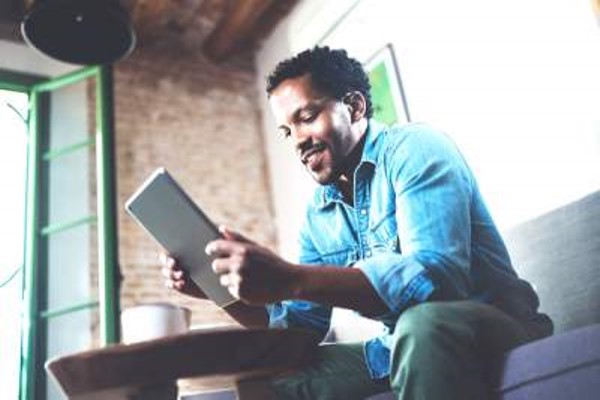 Man studying on tablet